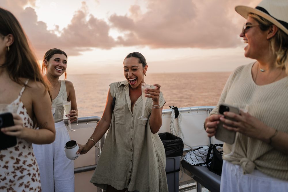 Friends toasting at golden hour